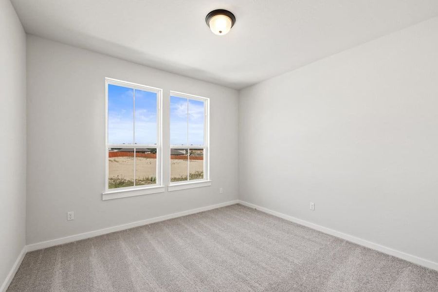 Spacious, unfurnished interior of a new home in Lariat, Liberty Hill (Image 46).