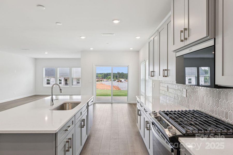 Photo is not of the actual home, but is an inspirational photo of builder’s model home and may depict options, furnishings, and/or decorator features that are not included