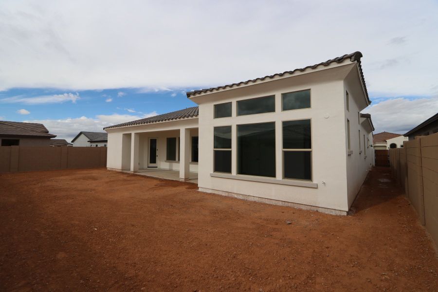 Exterior details and patio area of a home in Escena at Blossom Rock, Apache Junction (Image 3). Exterior details and patio area of a home in Escena at Blossom Rock, Apache Junction (Image 3).