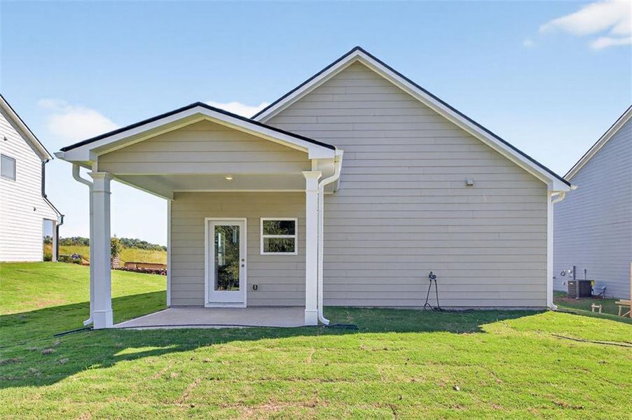 Exterior details and patio area of a home in Fair Oak, Calhoun (Image 3).