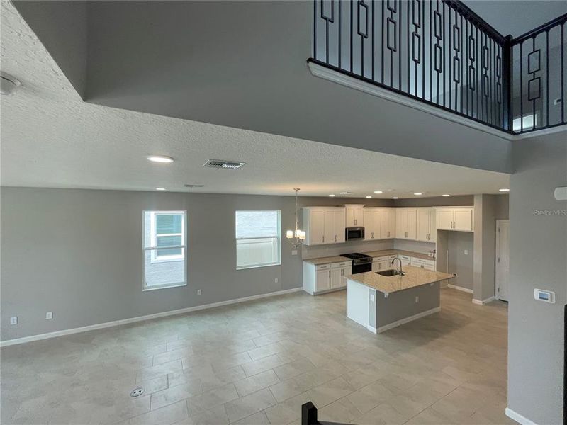 Spacious, unfurnished interior of a new home in Center Lake on the Park, St. Cloud (Image 49).