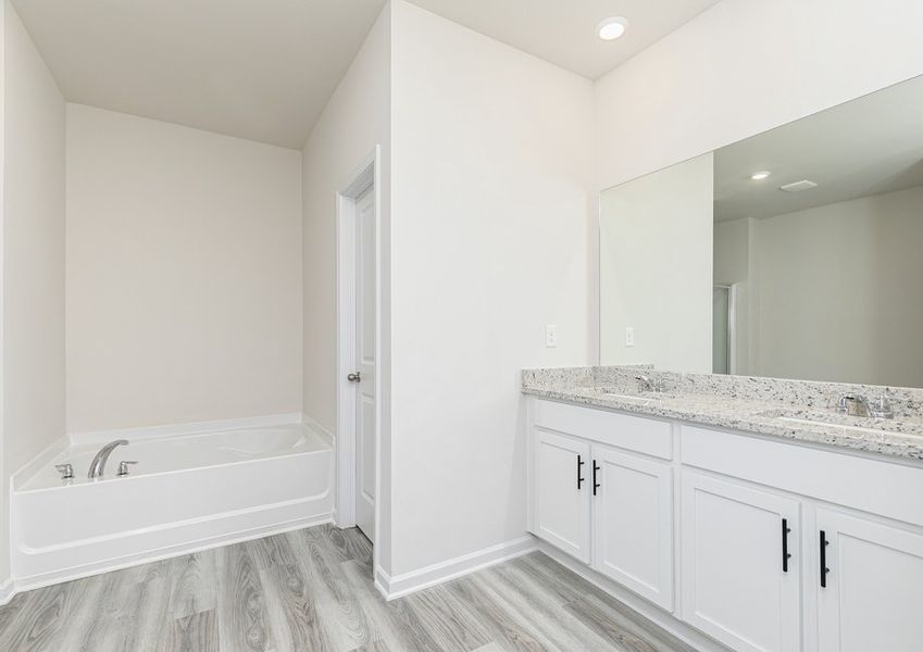 Get ready for your day in the master bathroom