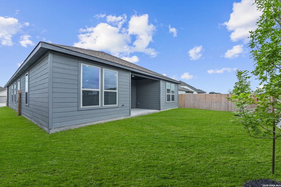 Exterior details and patio area of a home in Dove Song, Marion (Image 3).