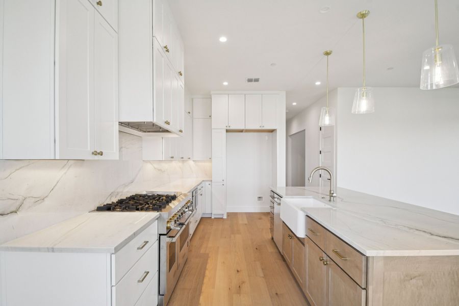 Furnished interior view inside a new home in Milky Way at River Place, Austin (Image 17).