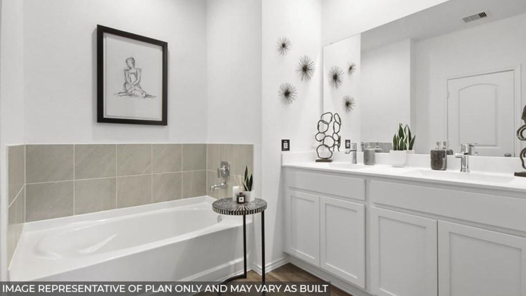 Furnished interior view inside a new home in Sunterra, Katy (Image 10).