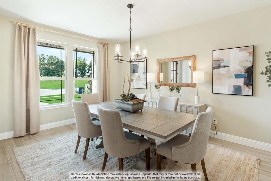 Dining room with wood table, six upholstered chairs, chandelier, and large windows with backyard view Dining room with wood table, six upholstered chairs, chandelier, and large windows with backyard view