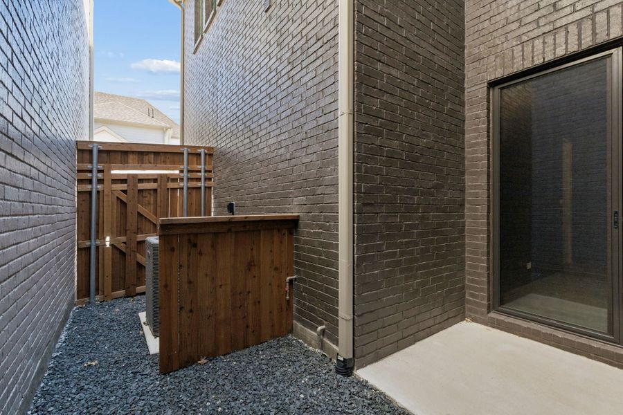 Representative exterior details of a home built from the Roosevelt by Centre Living Homes in Newman Village Townhomes, Frisco (Image 25).