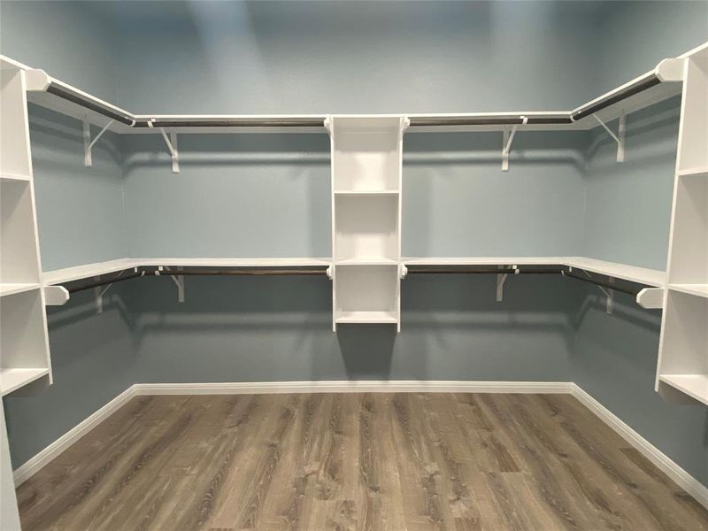 Ample shelving and hanging space in this well-appointed walk-in closet. Ample shelving and hanging space in this well-appointed walk-in closet.