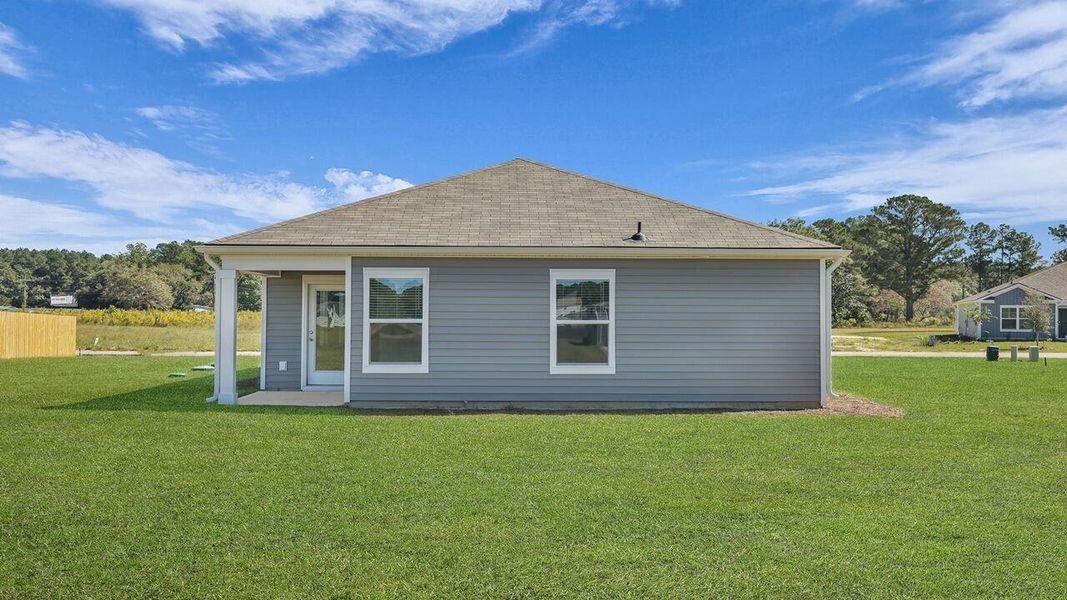 Exterior details and patio area of a home in Evergreen, Holly Hill (Image 16).