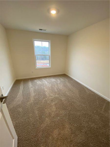 Spacious, unfurnished interior of a new home in Springwood Grove, Central (Image 25).