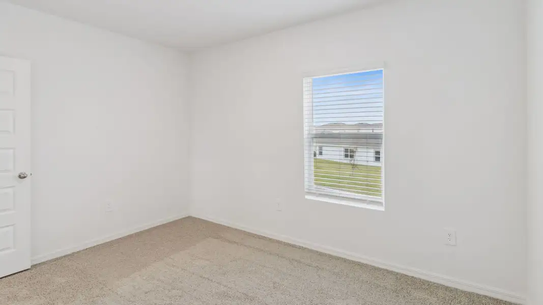 Representative unfurnished interior of a home built from the Coral by D.R. Horton in Hawthorne Ranch, Lakeland (Image 45).
