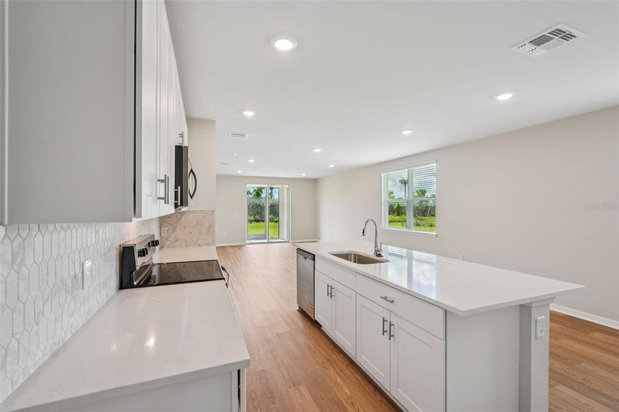 Furnished interior view inside a new home in Crescent Lakes - Premier Series, Punta Gorda (Image 4).