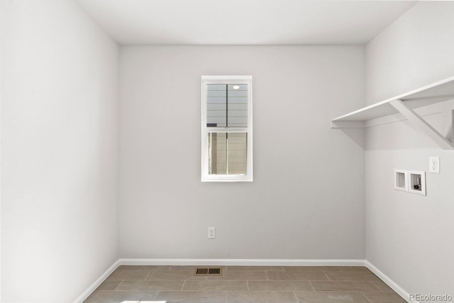 Spacious, unfurnished interior of a new home in The Villas Collection at Sterling Ranch, Littleton (Image 23).