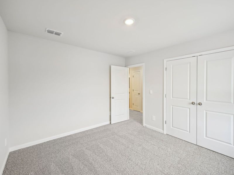 Spacious, unfurnished interior of a new home in Martin Springs - Estate Series, Lawrenceville (Image 25).