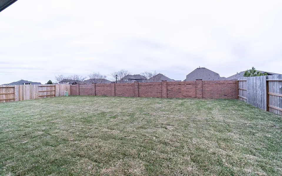 Front exterior of a new home in Marvida, Cypress, TX, highlighting curb appeal (Image 2). Front exterior of a new home in Marvida, Cypress, TX, highlighting curb appeal (Image 2).