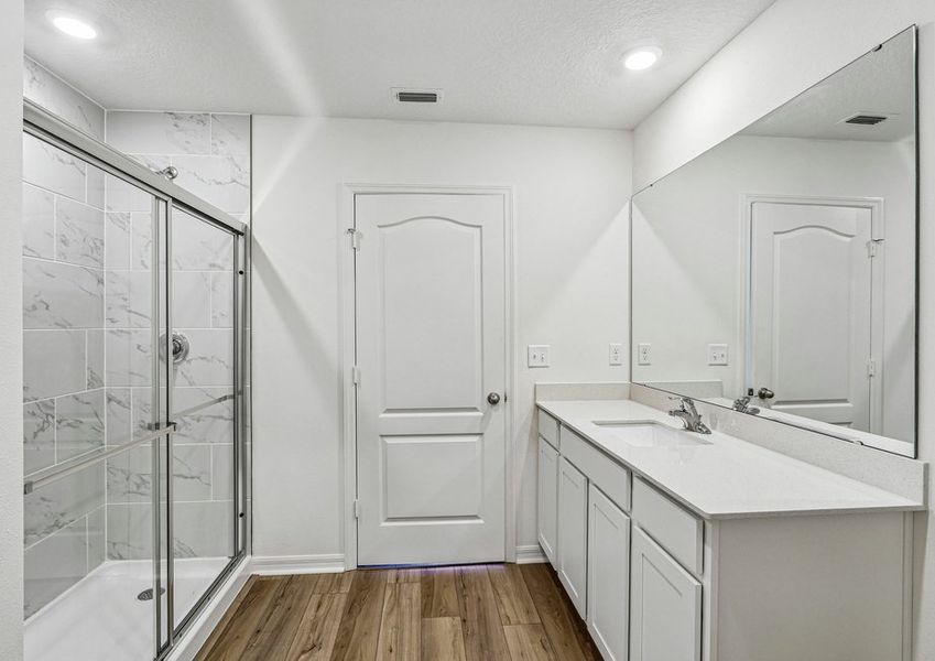 Get ready for your day in the master bathroom