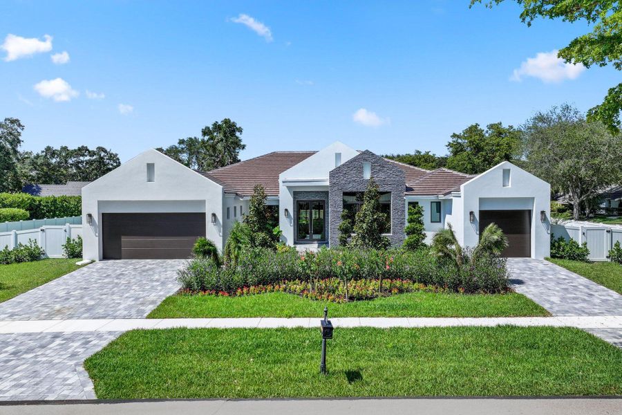 Front exterior of a new home in , Boca Raton, FL, highlighting curb appeal (Image 23). Front exterior of a new home in , Boca Raton, FL, highlighting curb appeal (Image 23).