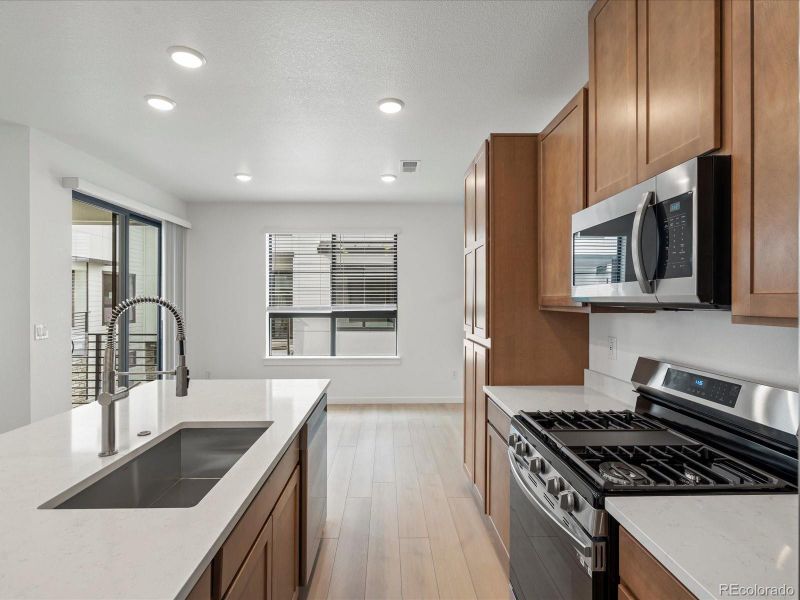 Furnished interior view inside a new home in The Hub at Virginia Village, Denver (Image 6).
