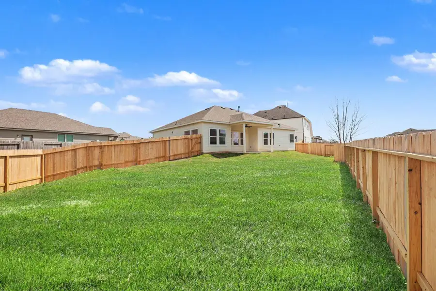 Exterior details and patio area of a home in Clear View Estates, Willis (Image 4).
