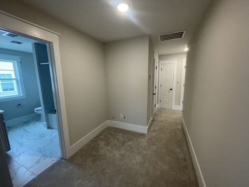 Spacious, unfurnished interior of a new home in The Sanctuary at Sunset Beach, Sunset Beach (Image 23).