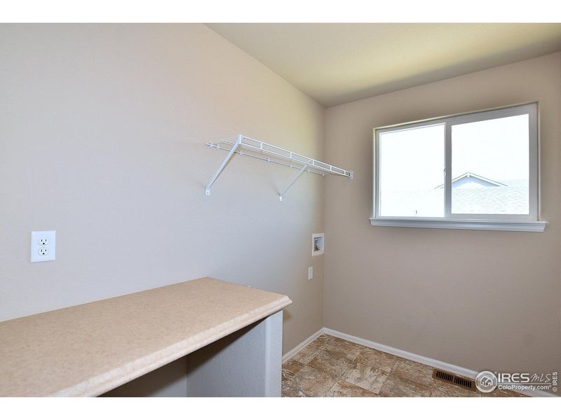 Spacious, unfurnished interior of a new home in Union Colony West, Greeley (Image 23).