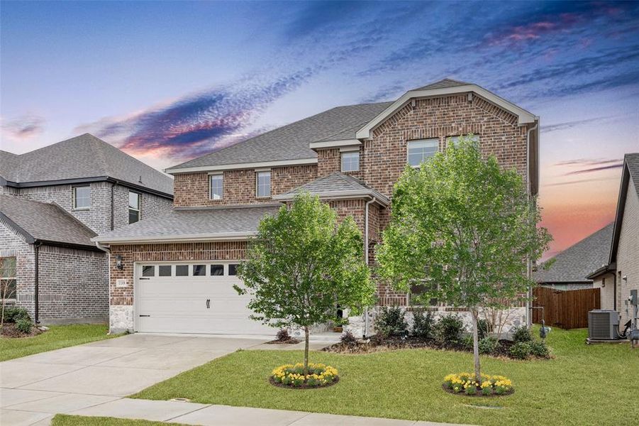 Front exterior of a new home in Wolf Creek Farms - Signature Series, Melissa, TX, highlighting curb appeal (Image 2). Front exterior of a new home in Wolf Creek Farms - Signature Series, Melissa, TX, highlighting curb appeal (Image 2).