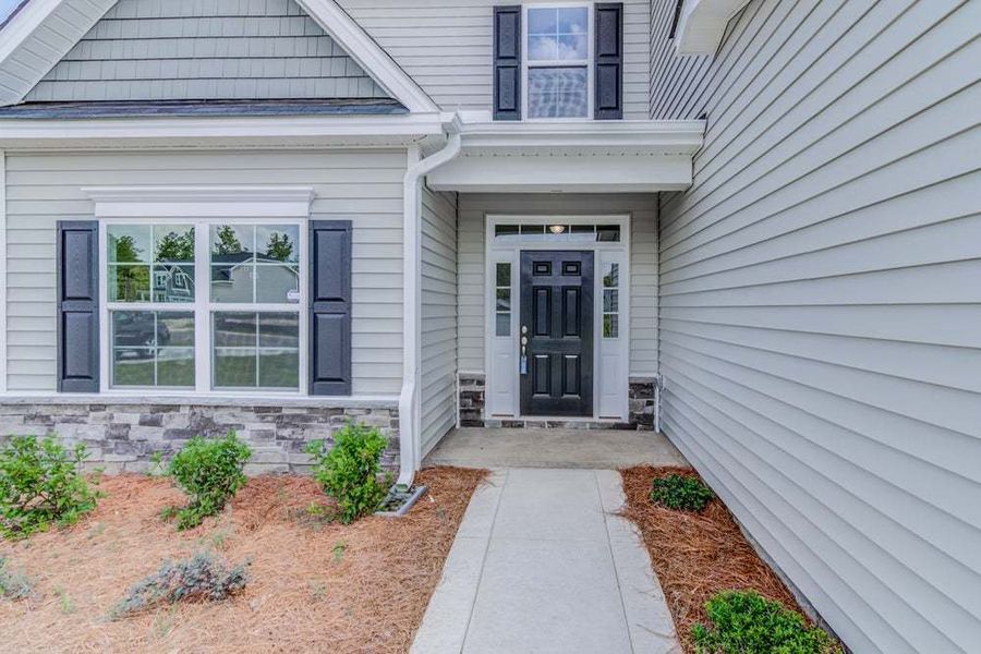 Representative exterior photo of a completed home built from the Aberdeen by Caviness & Cates Communities in Bartlett Manor, Youngsville, NC (Image 15).