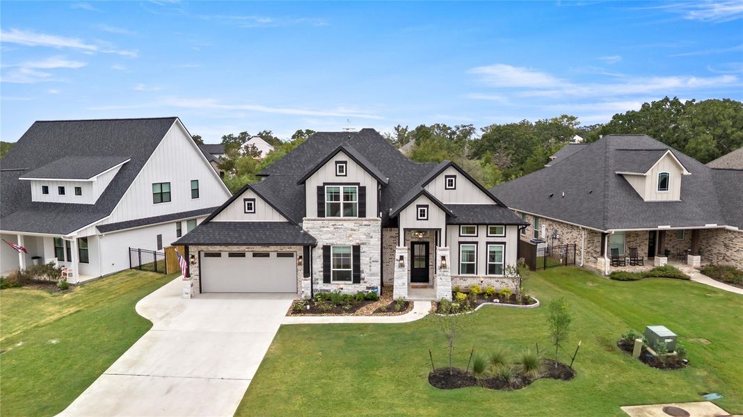 Front exterior of a new home in , Bryan, TX, highlighting curb appeal (Image 22). Front exterior of a new home in , Bryan, TX, highlighting curb appeal (Image 22).