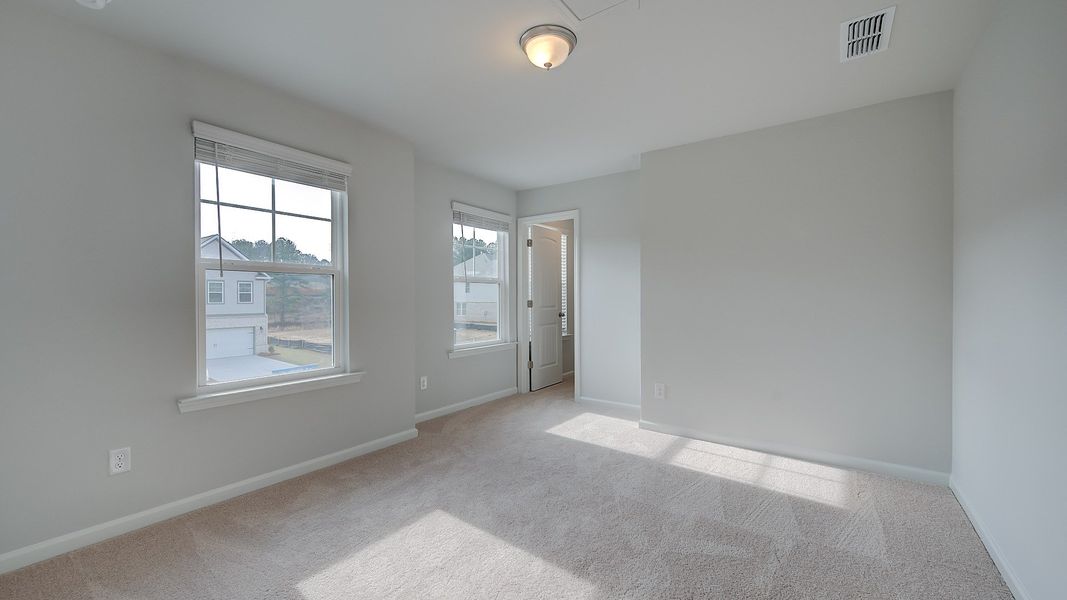 Furnished interior view inside a new home in Hamilton Lakes, Loganville (Image 23).
