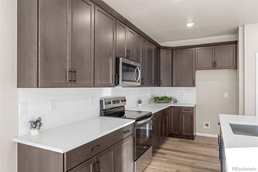 Furnished interior view inside a new home in Painted Prairie, Aurora (Image 6).
