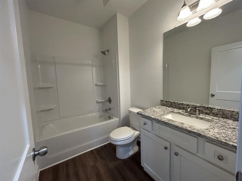 Furnished interior view inside a new home in Sutton's Landing, Statham (Image 9).