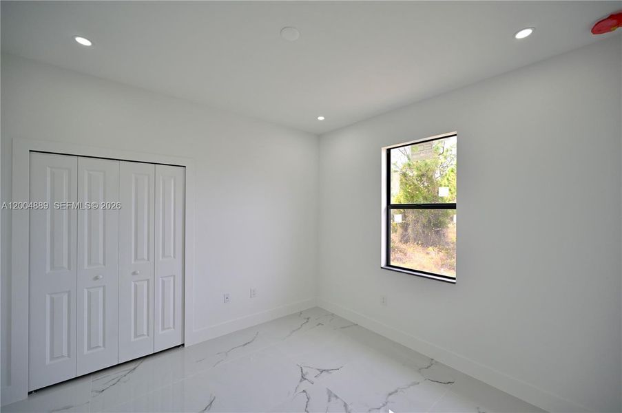 Spacious, unfurnished interior of a new home in , Lehigh Acres (Image 45).
