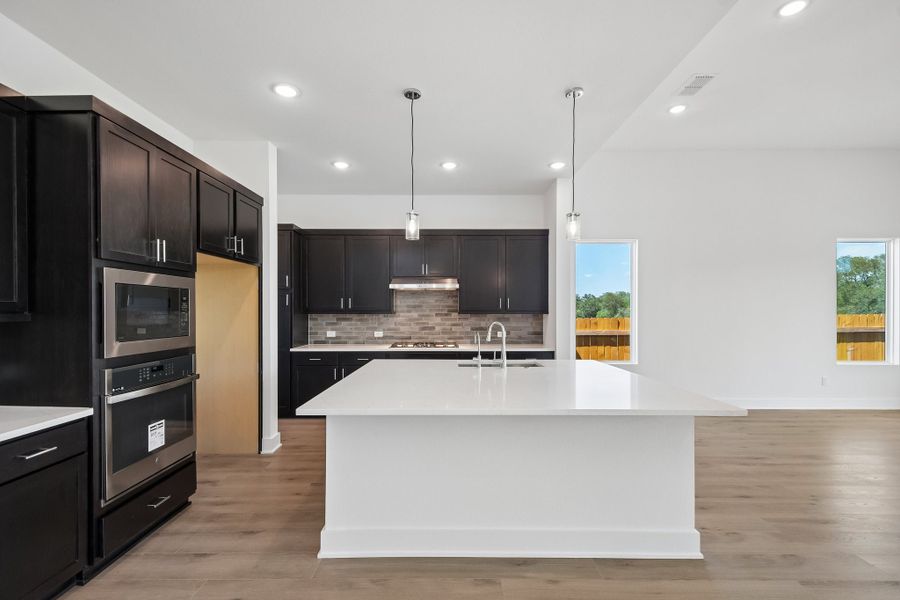 Furnished interior view inside a new home in Freedom at Anthem, Kyle (Image 3).