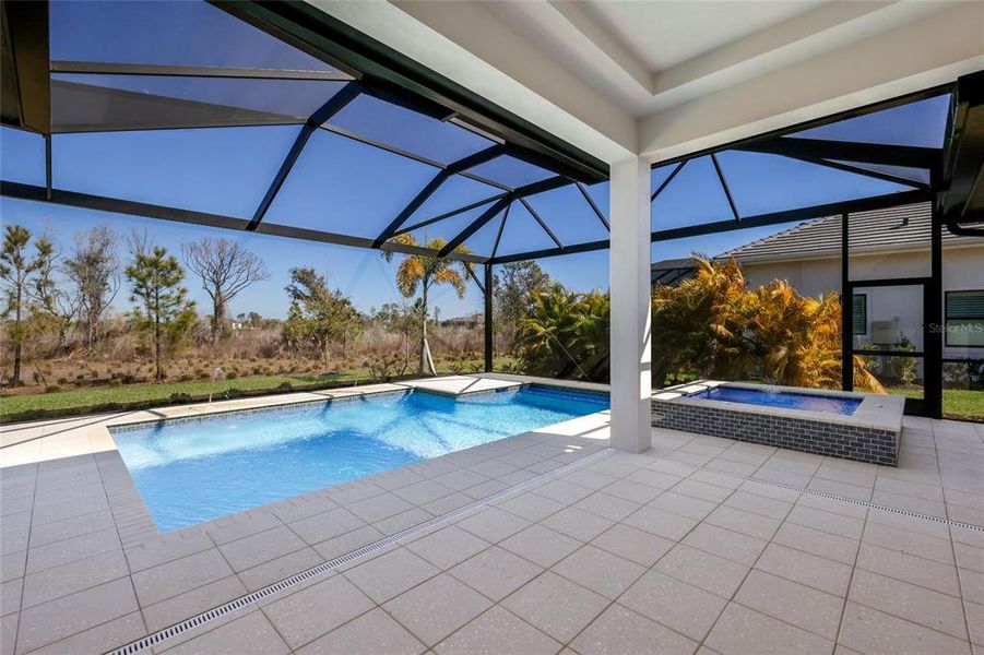 Exterior details and patio area of a home in Wild Blue at Waterside, Sarasota (Image 36). Exterior details and patio area of a home in Wild Blue at Waterside, Sarasota (Image 36).