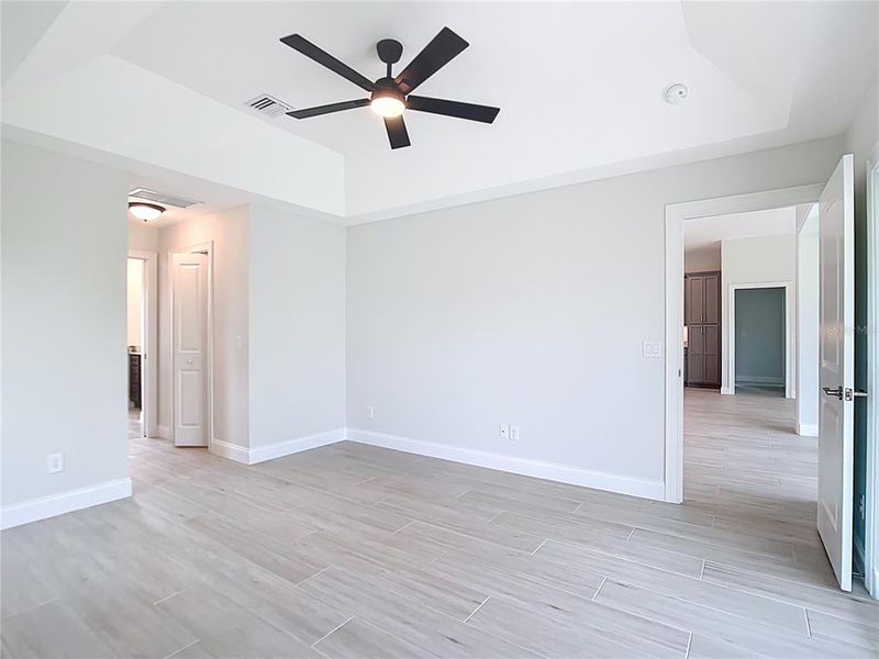 Spacious, unfurnished interior of a new home in , Port Charlotte (Image 21).