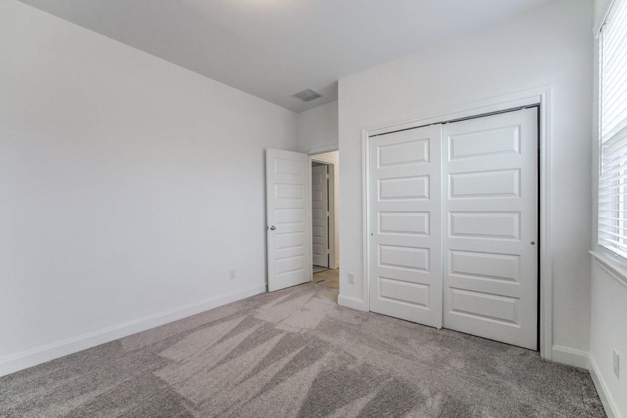 Spacious, unfurnished interior of a new home in Townsen Landing, Humble (Image 42).