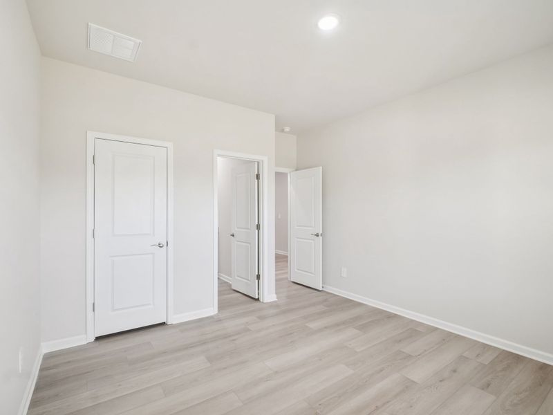Spacious, unfurnished interior of a new home in Oak Manor - Signature Series, Garner (Image 16). Spacious, unfurnished interior of a new home in Oak Manor - Signature Series, Garner (Image 16).