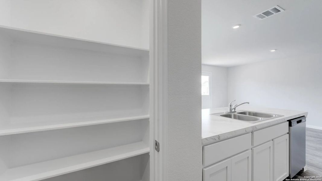 Furnished interior view inside a new home in Las Colinas, Kenedy (Image 6). Furnished interior view inside a new home in Las Colinas, Kenedy (Image 6).