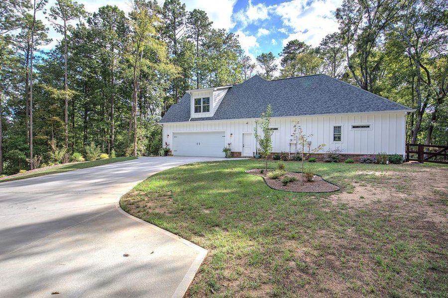 Front exterior of a new home in , Cartersville, GA, highlighting curb appeal (Image 26).