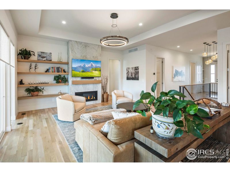 Modern touches with gas fireplace, floating shelves and LED lighting connected to Lutron App for smart energy features Modern touches with gas fireplace, floating shelves and LED lighting connected to Lutron App for smart energy features