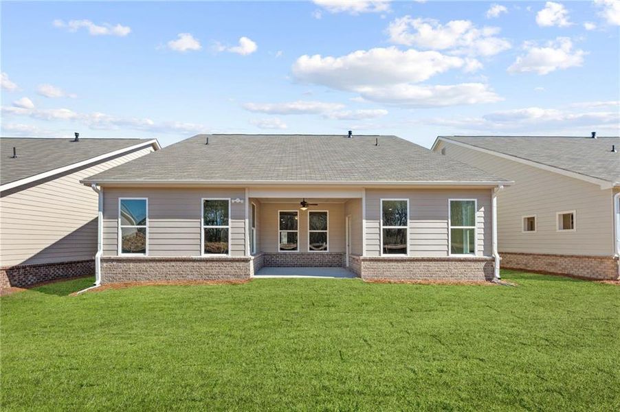 Exterior details and patio area of a home in Cooper's Walk, Loganville (Image 3).