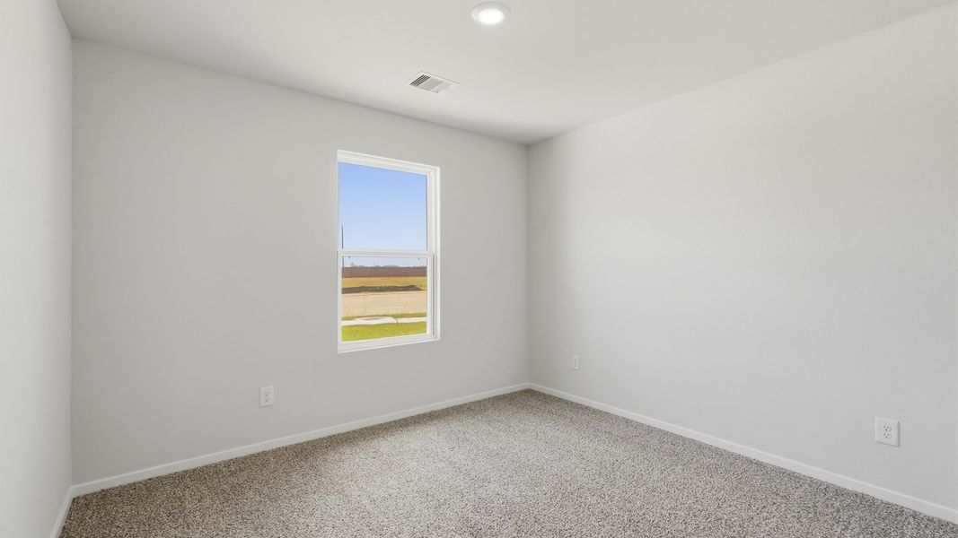 Spacious, unfurnished interior of a new home in Sunterra, Katy (Image 23).