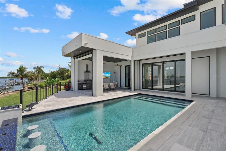 Front exterior of a new home in , Osprey, FL, highlighting curb appeal (Image 27).
