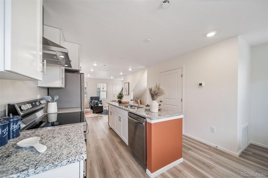 Furnished interior view inside a new home in Reunion, Commerce City (Image 39).