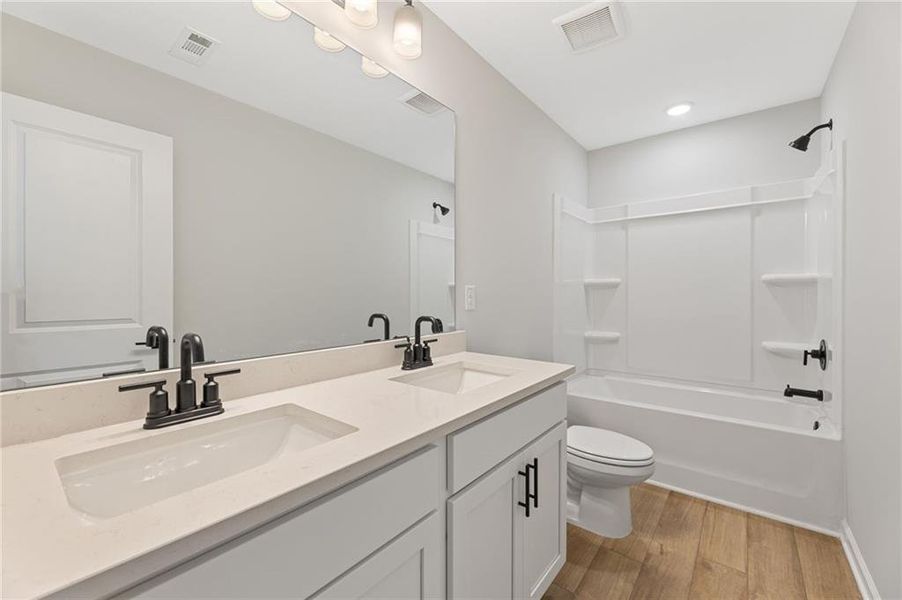 Furnished interior view inside a new home in The Bluffs, Canton (Image 12). Furnished interior view inside a new home in The Bluffs, Canton (Image 12).