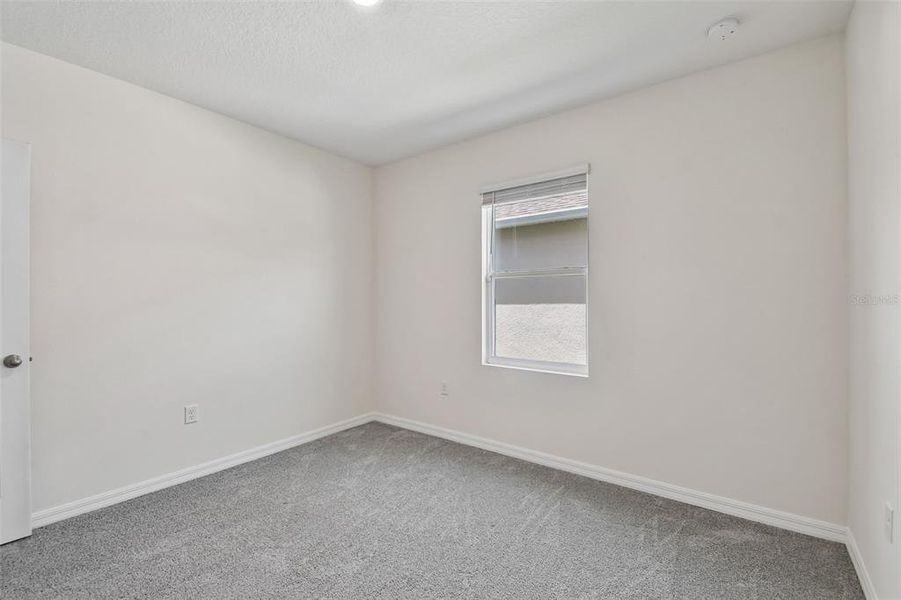 Spacious, unfurnished interior of a new home in Riviera Bella, Debary (Image 45).