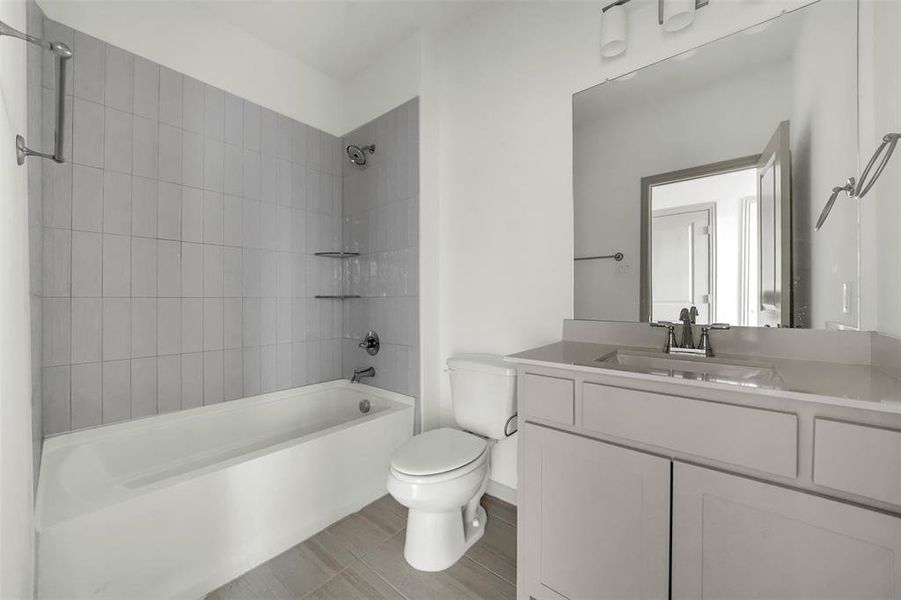 Full bathroom with shower / tub combination and vanity Full bathroom with shower / tub combination and vanity