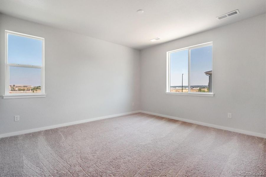 Spacious, unfurnished interior of a new home in Paired Homes at Alder Creek, Parker (Image 19).