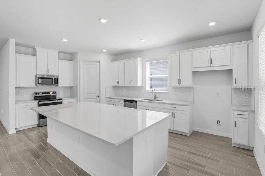 Furnished interior view inside a new home in The Cove at West Port, Port Charlotte (Image 11). Furnished interior view inside a new home in The Cove at West Port, Port Charlotte (Image 11).
