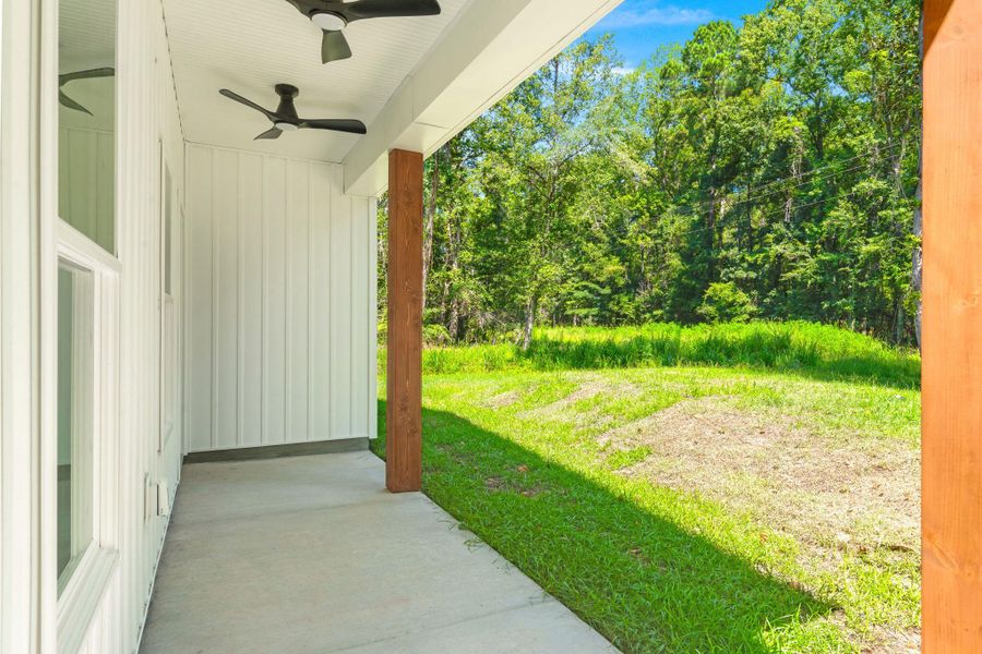 Exterior details and patio area of a home in , Ravenel (Image 3). Exterior details and patio area of a home in , Ravenel (Image 3).